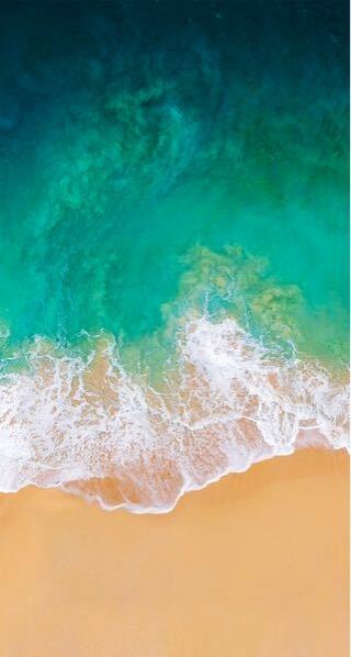 Iphone8 最新os を使っています 壁紙でグリーンの波と砂浜の Yahoo 知恵袋