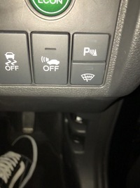 ホンダのフィットの運転席にあるこのボタンはどういう意味があるのです Yahoo 知恵袋