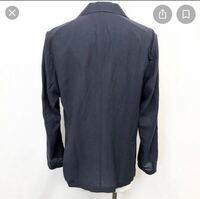 スーツを買いました 背中の下の切れ目のヒラッとするところに仮縫いみたいな Yahoo 知恵袋