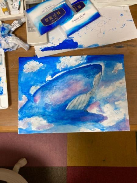 【至急】小5です。空を泳ぐクジラを描きました。アドバイス欲しいです。上の破れてるのはお気になさらず..。画像汚くてすみません！