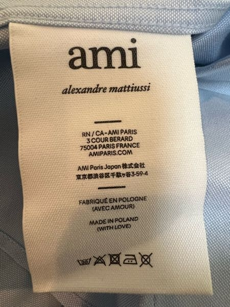 amiparisのニットをファーフェッチで購入したのですが、このタグ