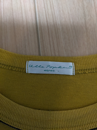 古着屋で買ったこのTシャツのブランドが知りたいのですが読め