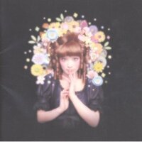 椎名林檎さんが勝訴ストリップのジャケット こちらでは上半身のみ Yahoo 知恵袋