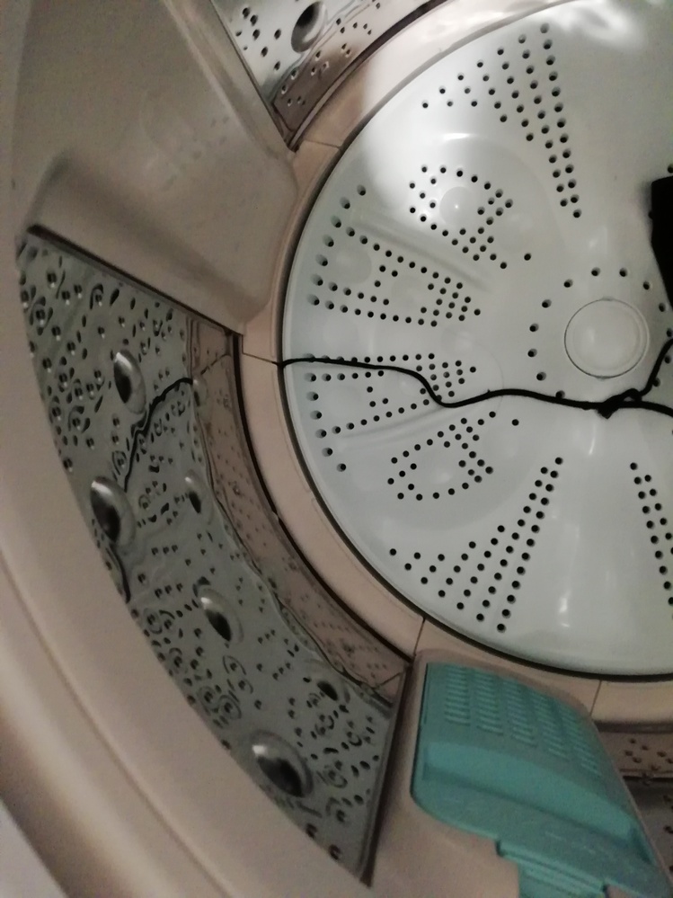 洗濯槽の穴に洗濯物が挟まって抜けなくなりました。 - 洗濯機の