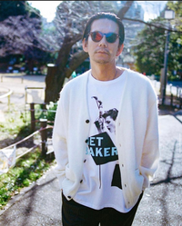 野村訓一さんがいつも着用しているWACKOMARIAモヘアカーディガン