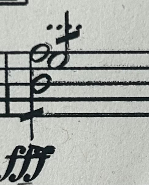 音楽記号についてです チェロの楽譜なんですけどソの上にある四つの点の意味がわかりません 誰か教えてください！