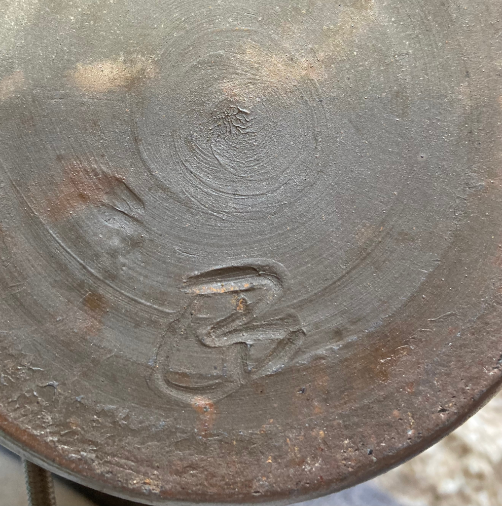 備前焼について質問です。花瓶の底の模様の意味を教えていただきたい