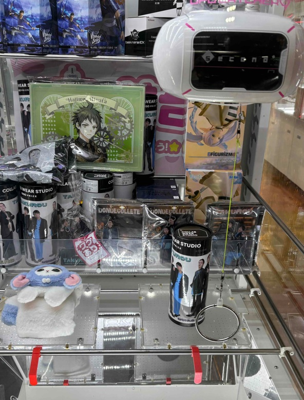 ゲーセンに質問です。クレンゲームの台の上にあるもう投入されていて