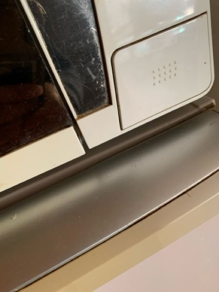 緊急です電子レンジの扉があかなくなりました。ハンドル式ではなく、ボ 
