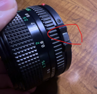 CANONフィルムカメラNewFDレンズの着脱ボタンが、固着して動か