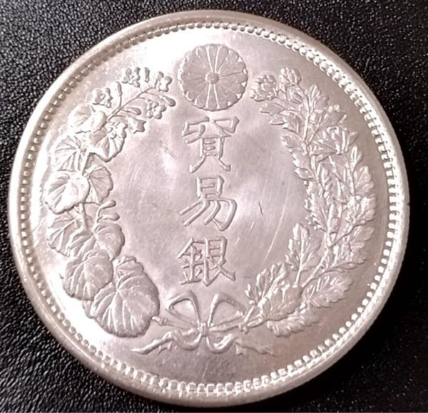 明治8年一円銀貨、直径38.8.厚み26ミリ、重さ27．2g多少の誤差わある