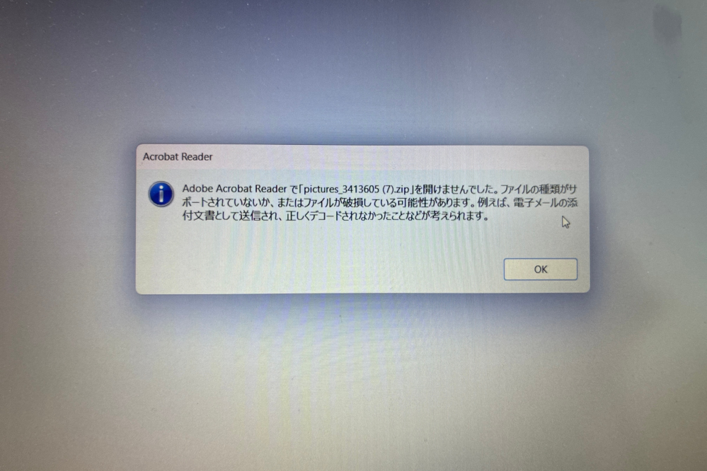 パソコンで写真のダウンロードができません。この様に表示されるのです