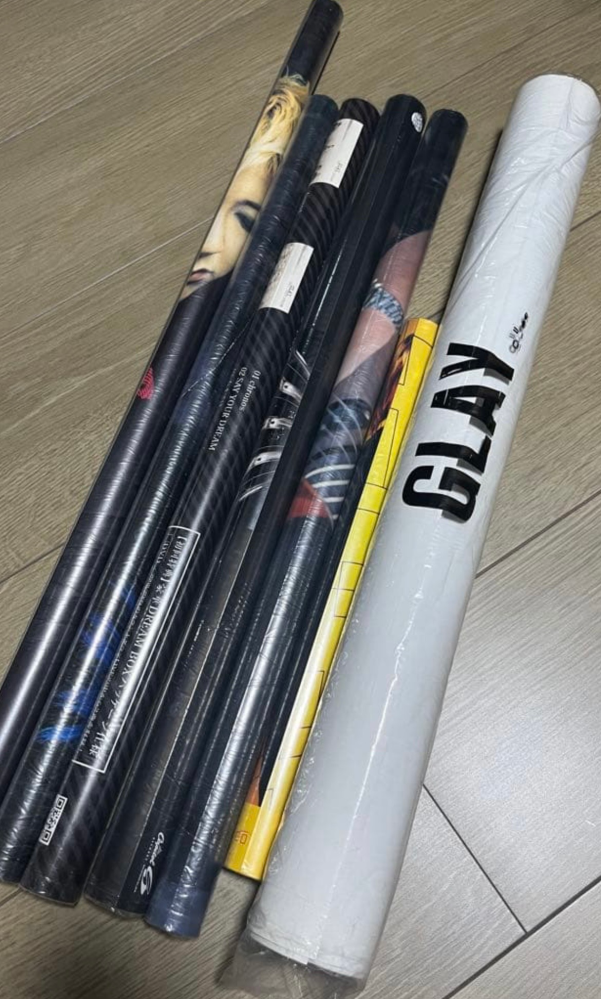 急募】GLAYのポスター7本セットなのですが未開封品で中身がなにか