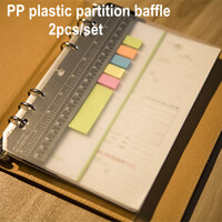 ルーズリーフに挟む 写真の黒いプラスチックの細長い部分の名前を教えてくださいa Yahoo 知恵袋