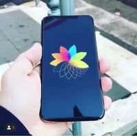 店頭のiphoneの展示品で流れている 虹色のロゴがクルクル回っている動画は自 Yahoo 知恵袋