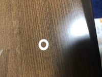 バリカンの電池交換でニカド電池をネットで購入したのですが、付属品としてこの白い輪っかのようなものもついてきたのですが、
これはどこにつけるものなのでしょうか？ 