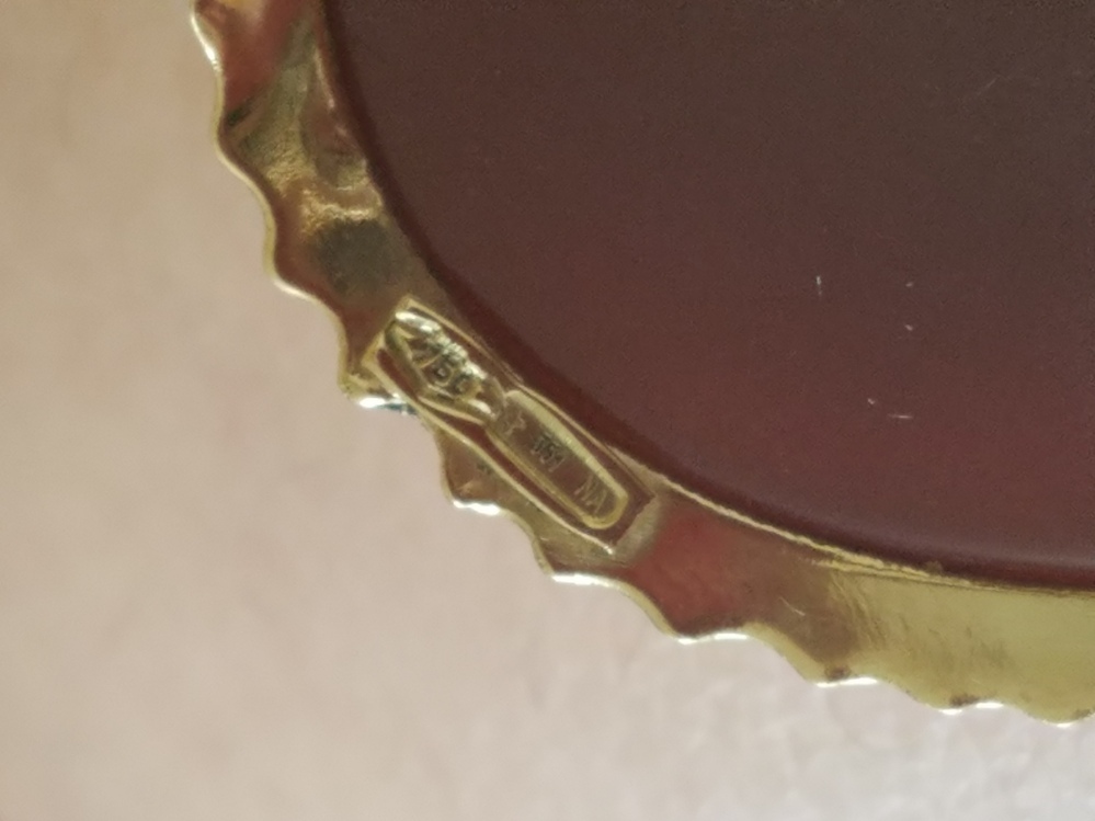 カメオの刻印について。750は確認できます。その横の「P???NA カメオの刻印について。750は確認できます。その横の「P???NA