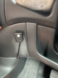 車のハンドルの左下にあるこのボタンは何のボタンですか 中古車を Yahoo 知恵袋