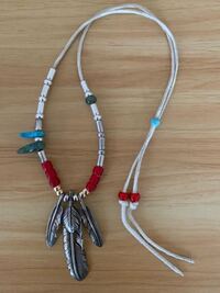 ゴローズのフェザーをビーズで写真の様に 組んでいますが3枚組み Yahoo 知恵袋