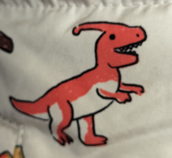 このイラストの恐竜はなんという名前の恐竜ですか？ 3歳児が着ているアウターのイラストです。この恐竜の名前を知りたいらしく、泣き止まないので検索をかけましたが、色々な種類が出てきて分かりません(；；)