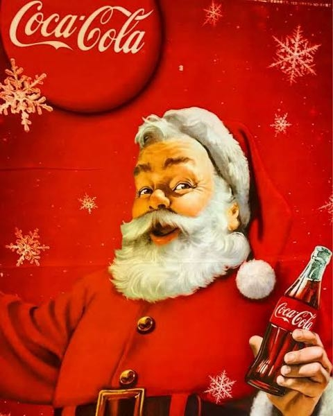 コカ・コーラのサンタクロースが世界を席巻する前、サンタクロースは何色だったのですか。