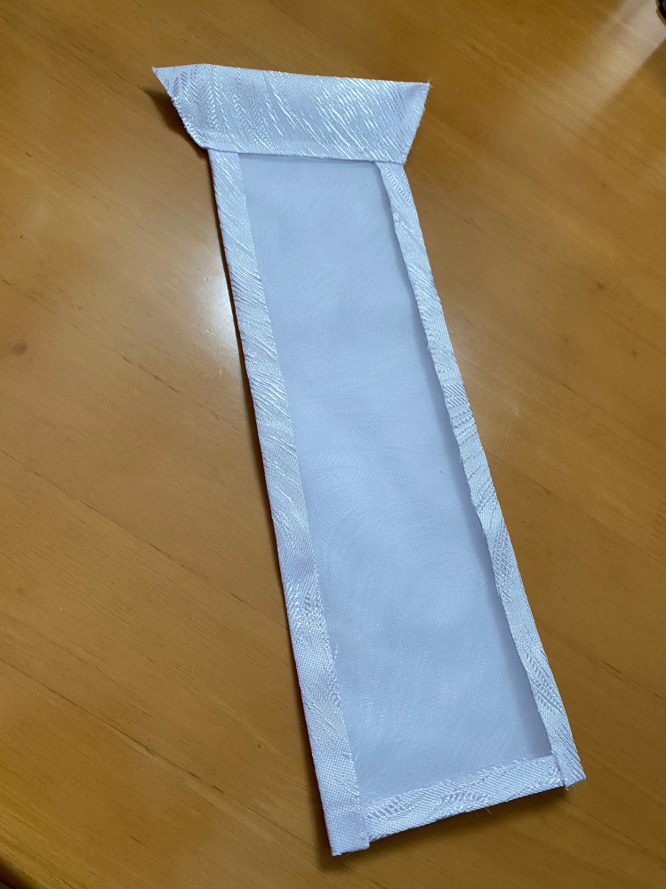 これがなんなのか分かる方いらっしゃいますか？ 和の布が筒状に縫ってあり、表面？にレースが使われております。