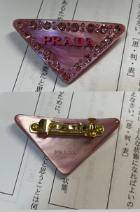 PRADA ヘアピン ピンク【確実正規品】 正規品】PRADA プラダ ヘアピン ピンク - メルカリ