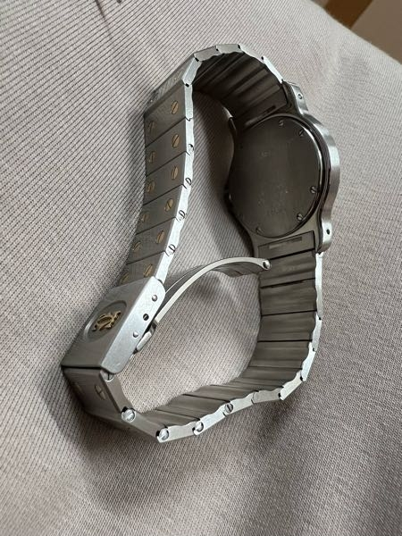カルティエのサントスオクタゴンのコマ調整の仕方わかる方いませんか
